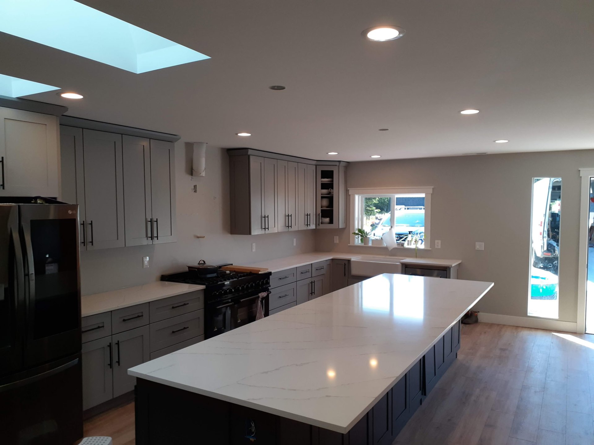 Calacatta quartz waterfall island in Bellevue, WA kitchen
